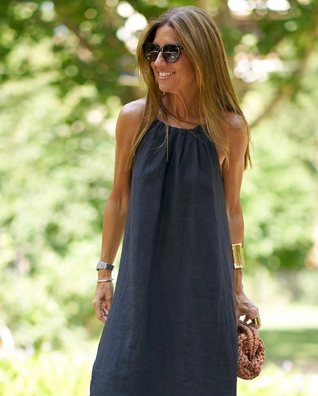A halterneck slit cotton and linen casual holiday dress
